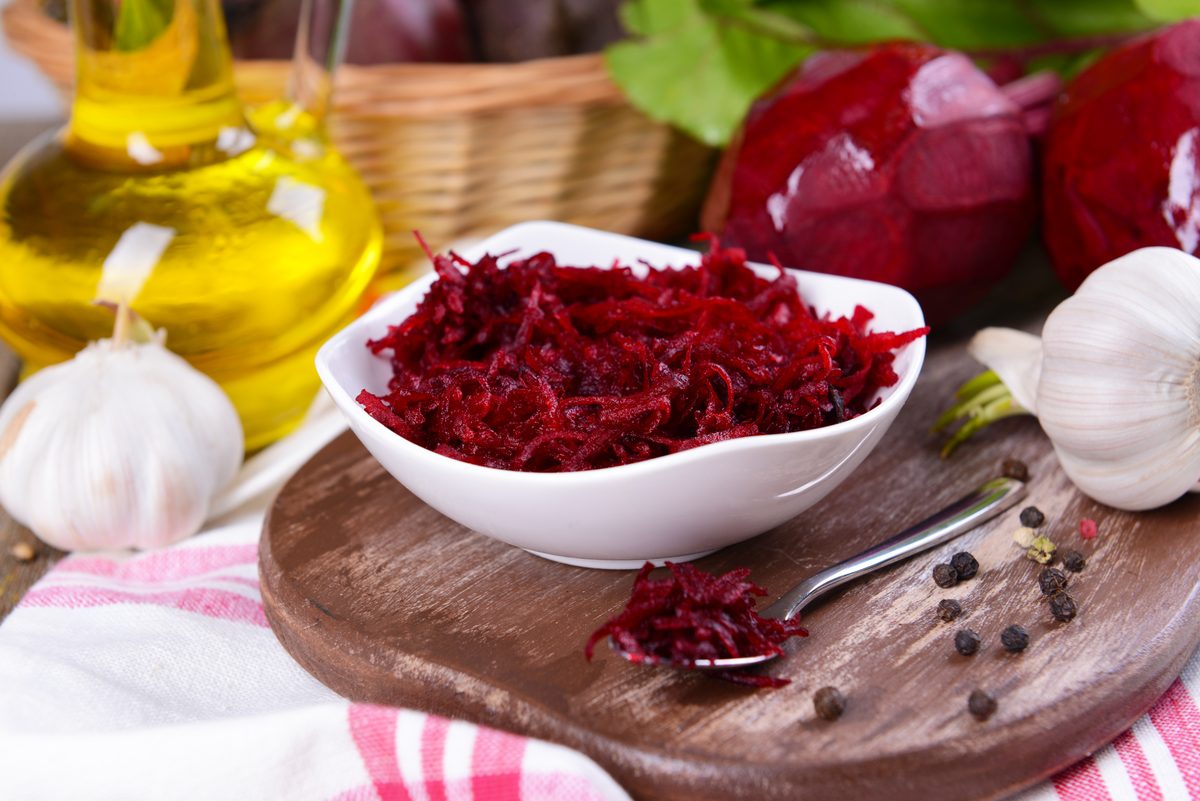 Close-up of grated raw beetroot in a bowl