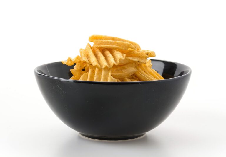 Bowl of ridged crisps, a snack that may contain glutamate