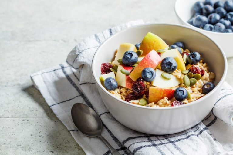 Bowl of apple and blueberry bircher muesli