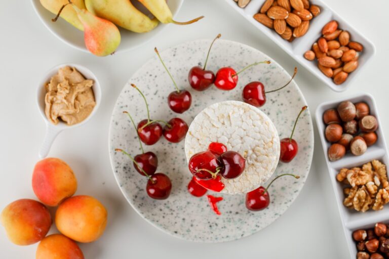 Rice cake with cherries, apricots, nuts and peanut butter