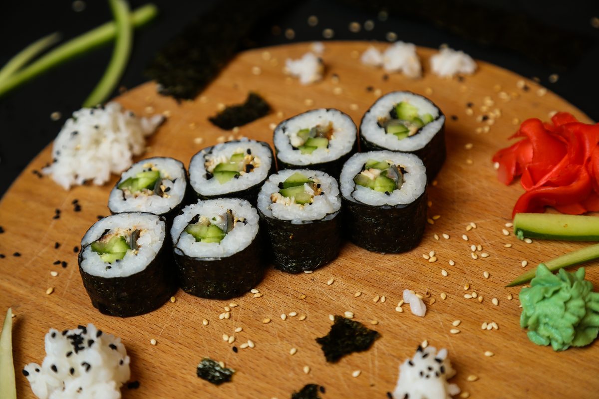 Cucumber maki rolled in a nori sheet, ginger and wasabi