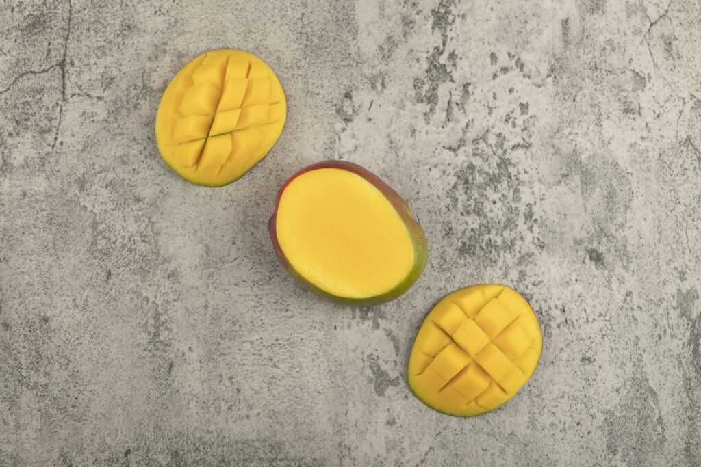 Diced mango on a marble worktop