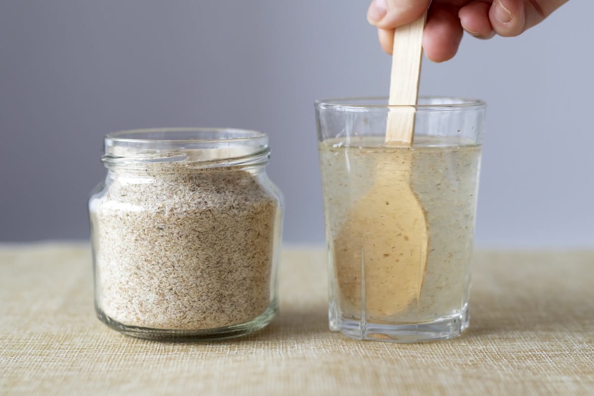 Psyllium mixed in a glass of water before drinking it