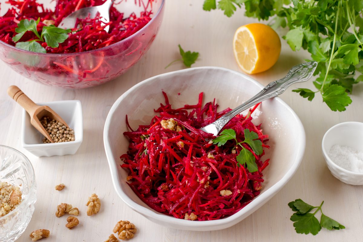 Grated raw beetroot and carrot salad with walnuts