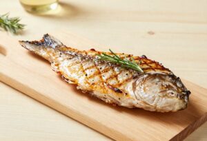 Grilled sturgeon steak