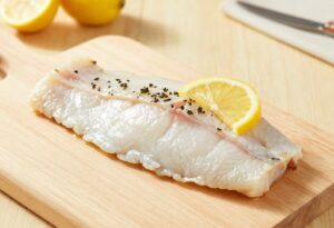 Cooked pangasius fillets with lemon