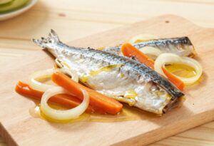 Herring marinated in oil with onions