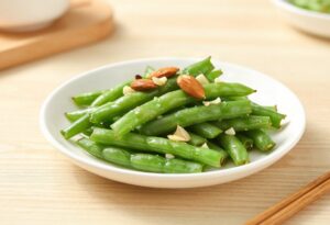 Poêlée de haricots verts à l’ail et aux amandes