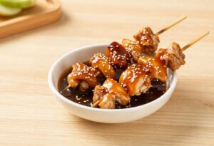Teriyaki sauce and glazed skewers
